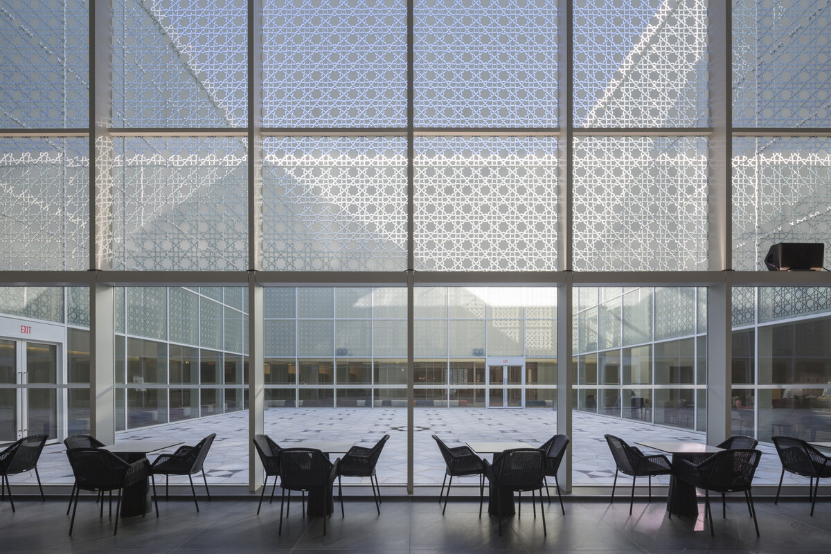 Aga Khan Museum entrance looking into courtyard through geometric screen