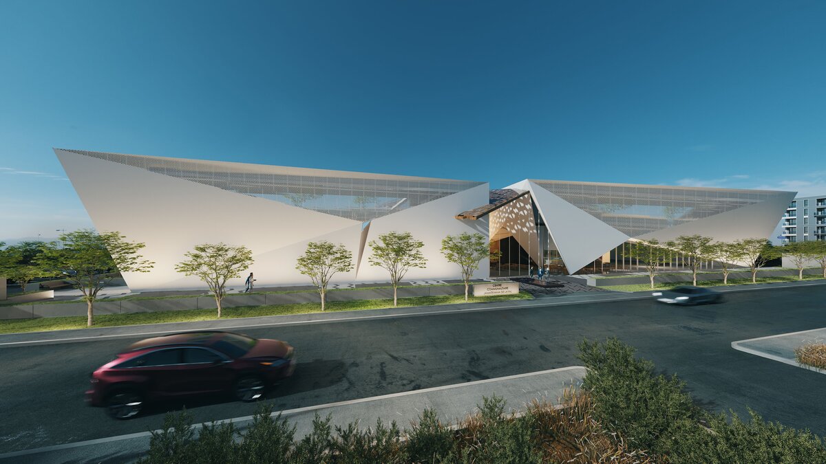 Laval Jamatkhana exterior, angular white facade